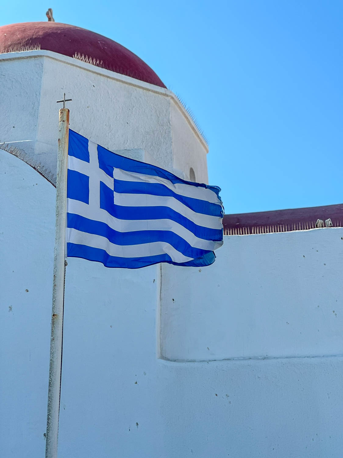 Whitewashed buildings with blue accents in Mykonos Town (Mykonos, Greece)