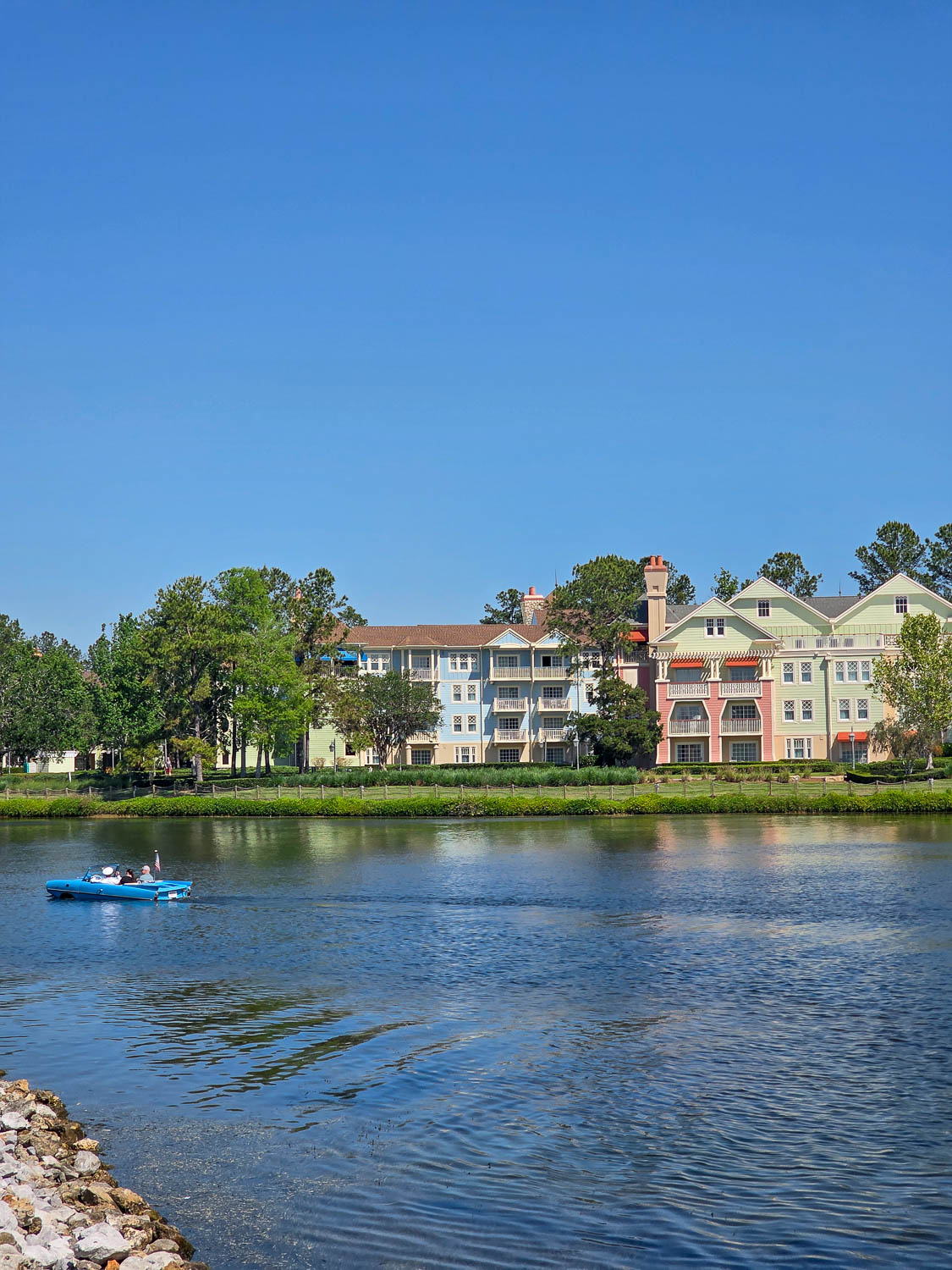 Vintage Amphicar driving into the water at Disney Springs