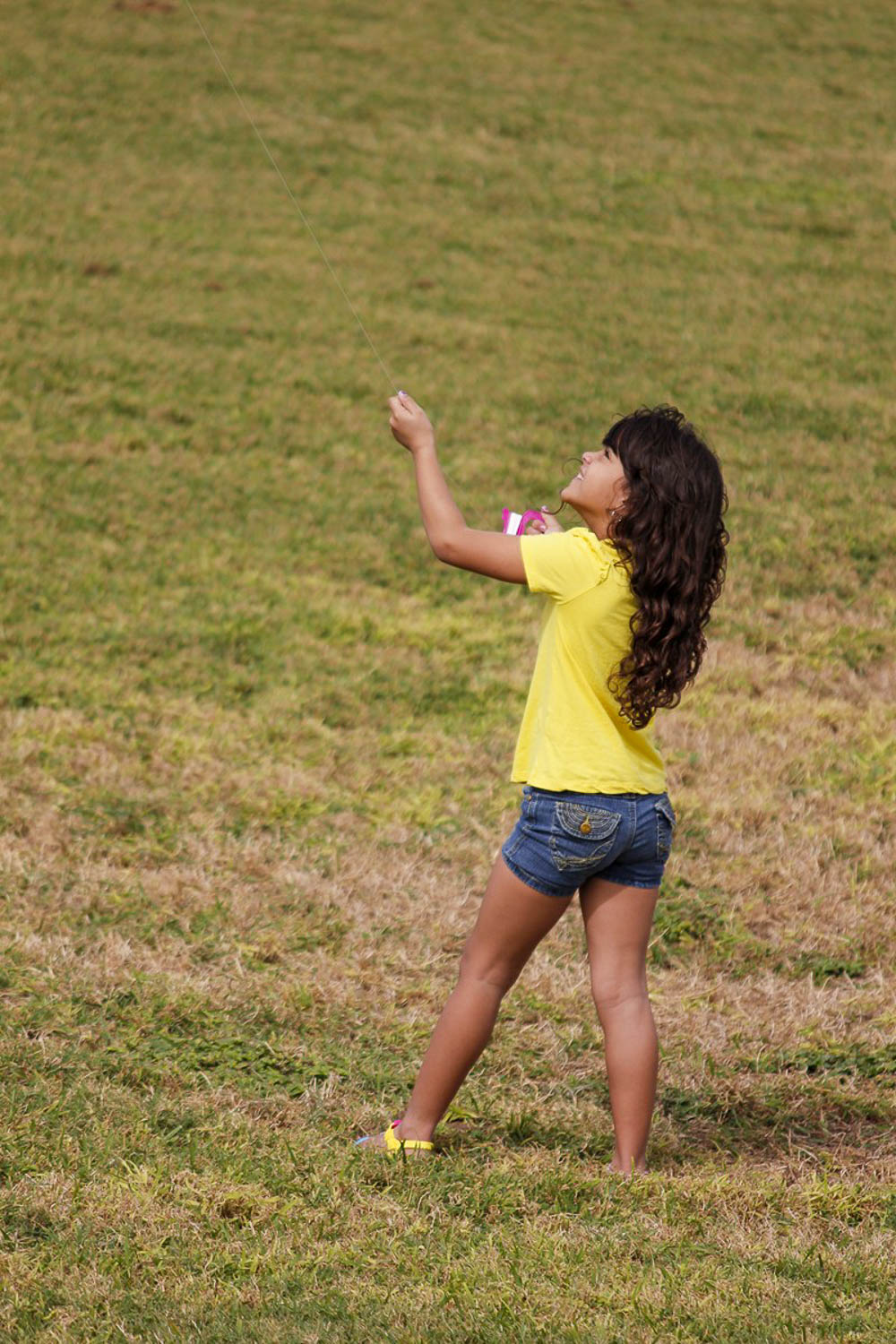 Kite flying on grassy grounds of Castillo San Felipe del Morro (Old San Juan, Puerto Rico)