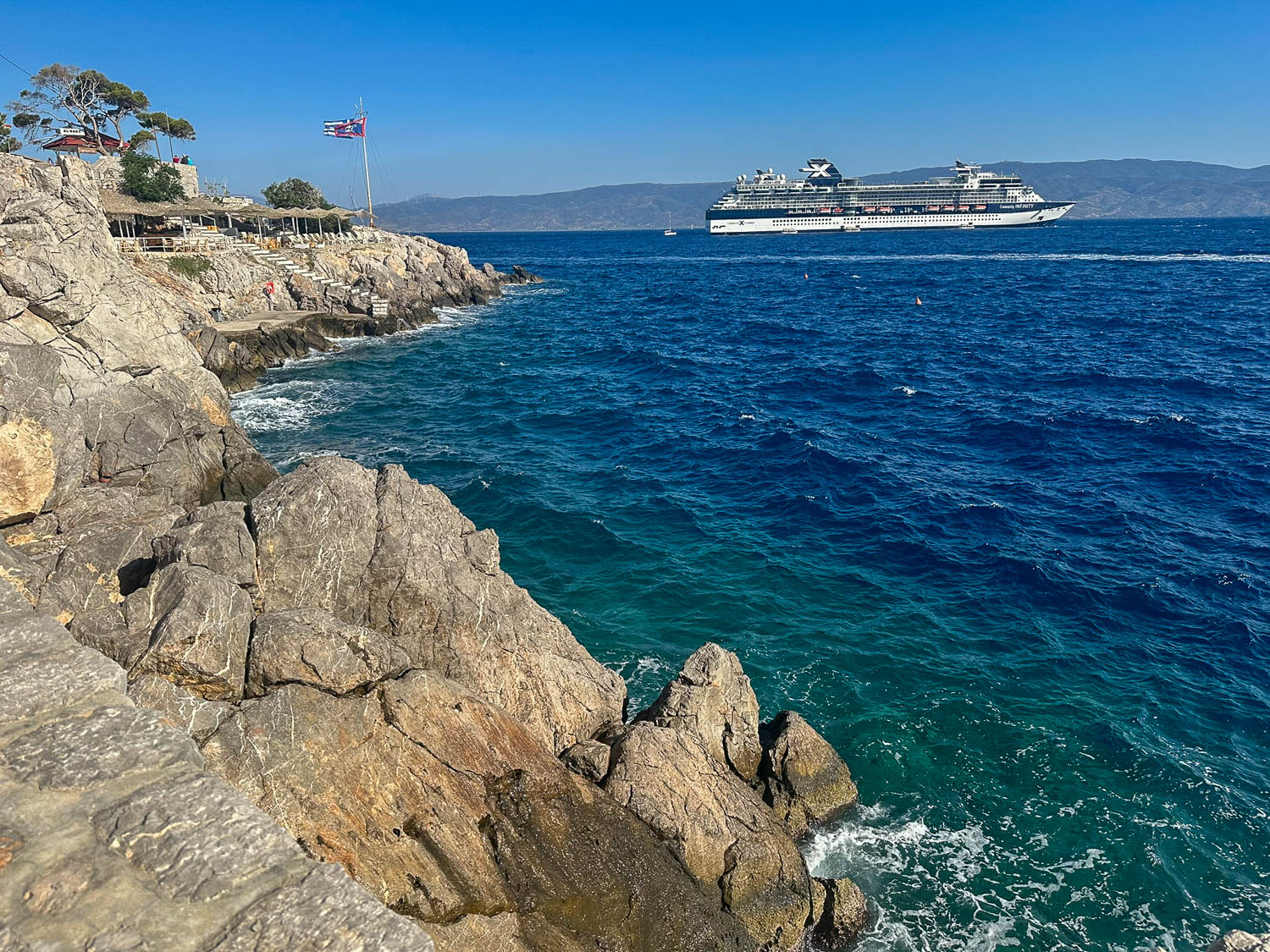 The steep stairs and concrete platforms of Spilia Beach Hydra, Greece
