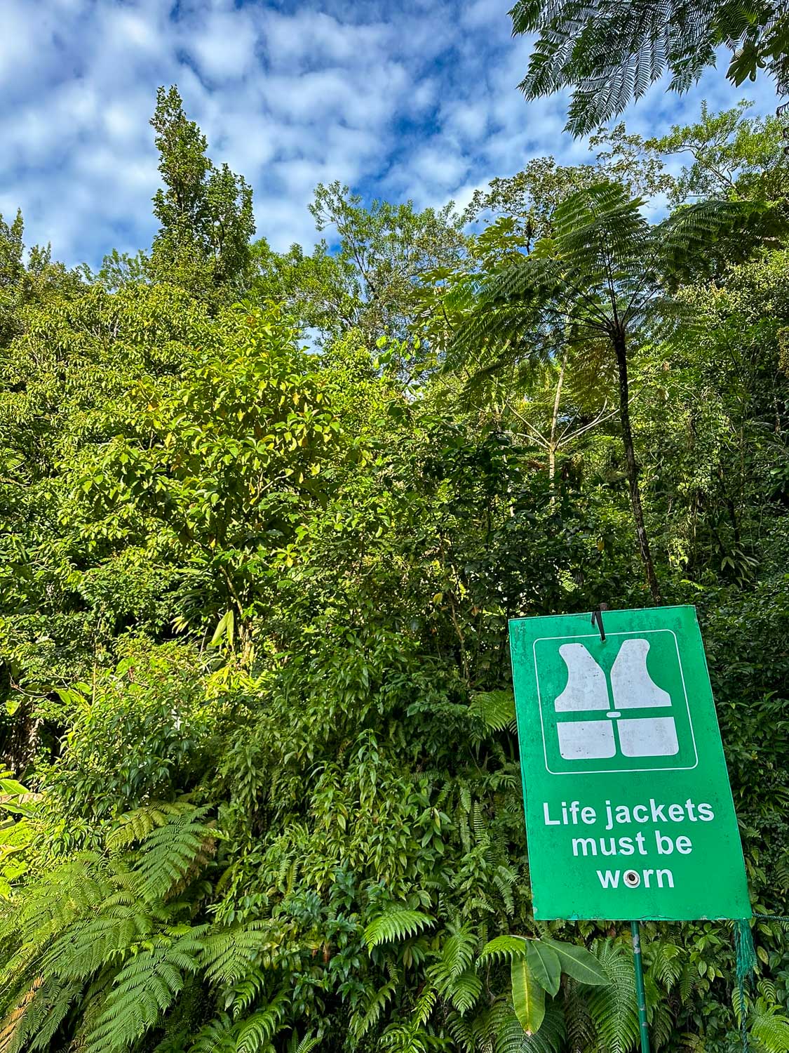 Posted safety warnings and guidelines at the entrance to Titou Gorge in Dominica