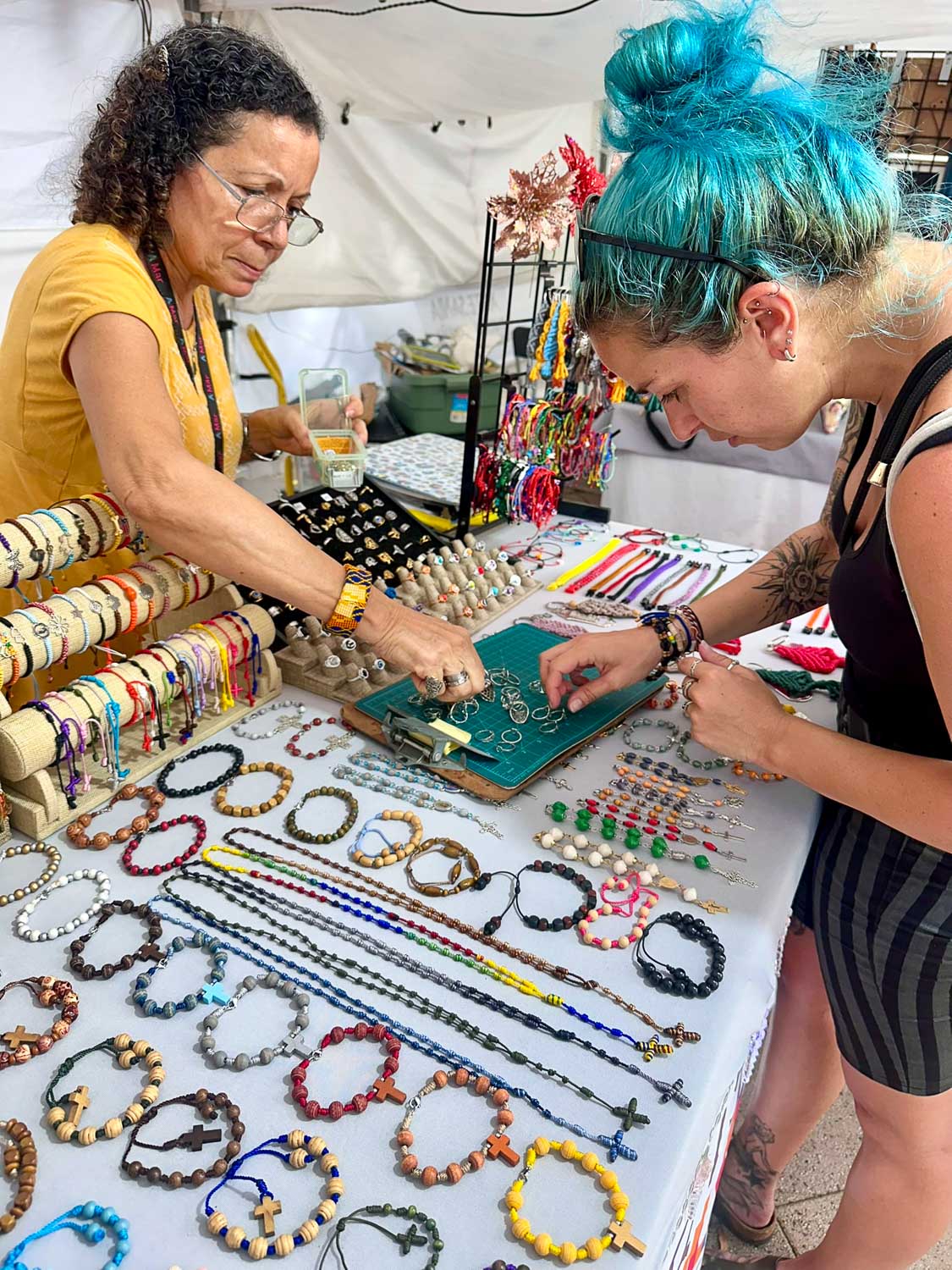 Silver rings and handcrafted jewelry at an artisan market (Paseo de la Princesa, Old San Juan)