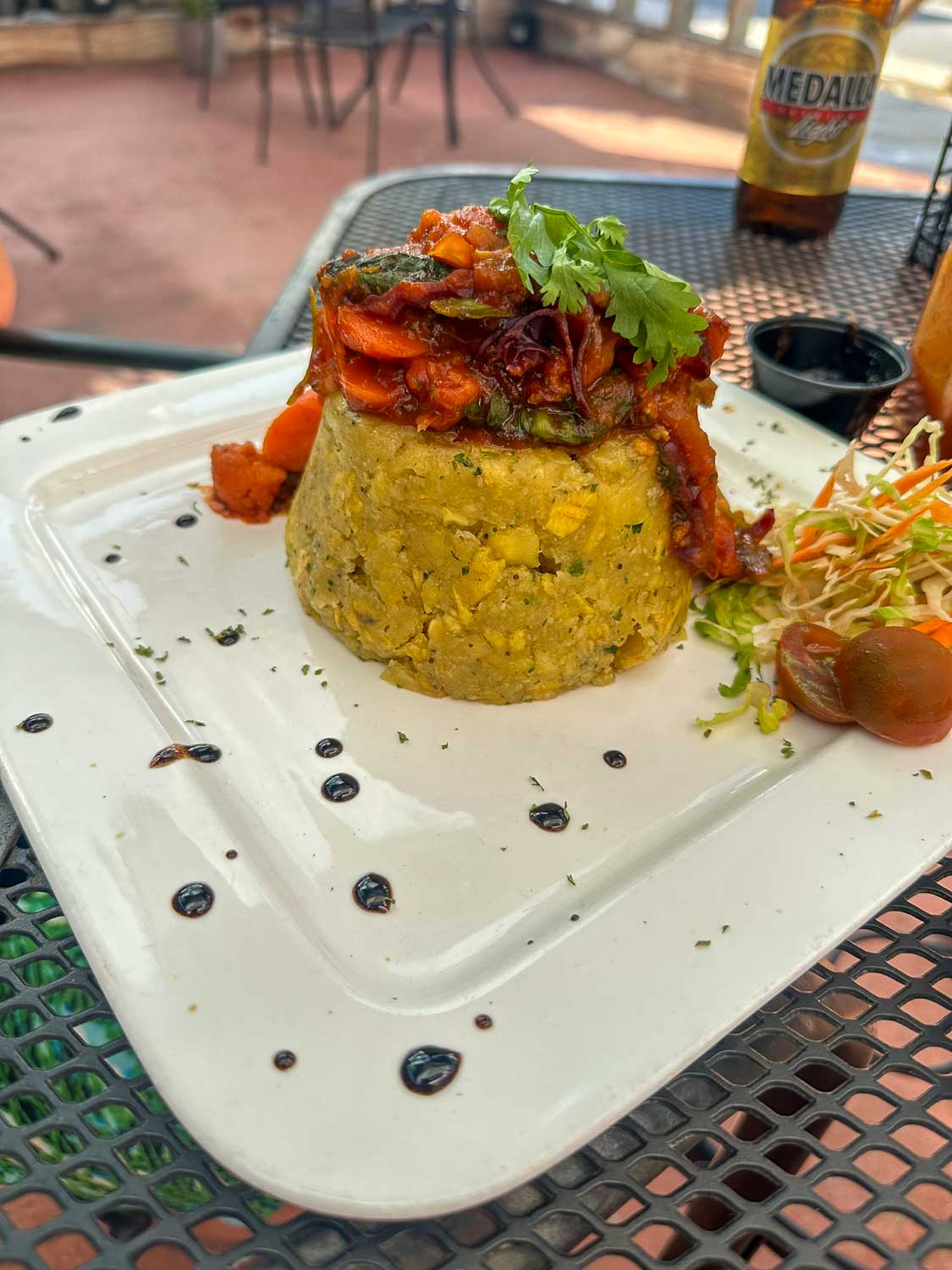 Traditional vegetarian mofongo served on a plate at a restaurant (Bocas Del Mar, Puerto Rico)