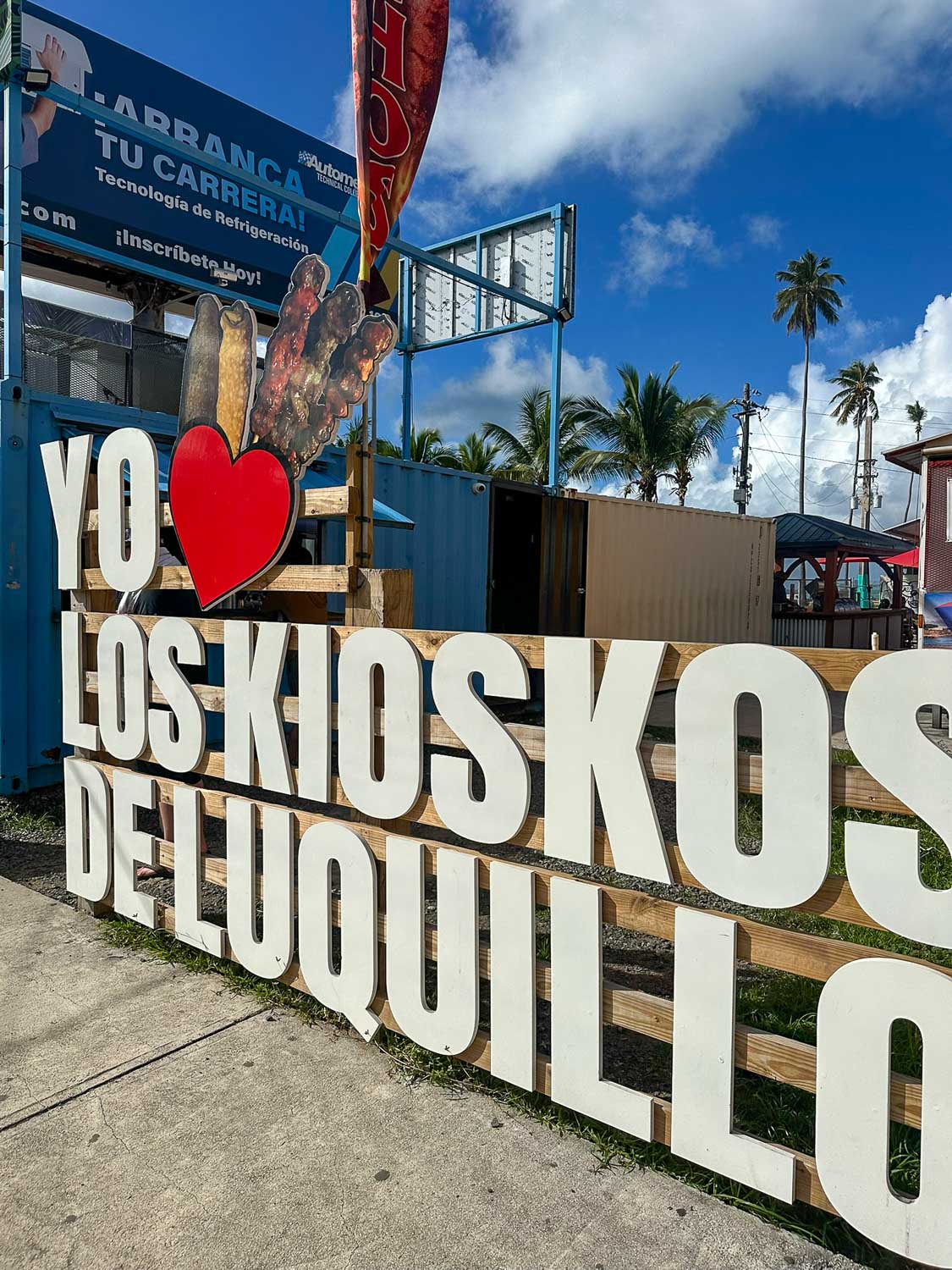 Dining kiosks and beachfront near Luquillo Beach close to El Yunque National Forest (Puerto Rico)