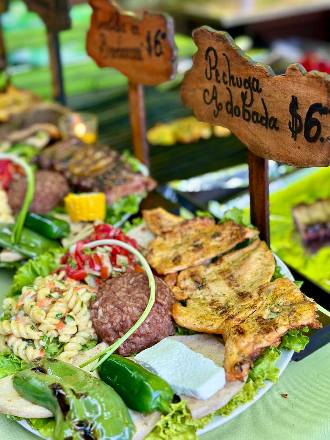 Traditional Salvadoran food including pupusas, local dishes, and fresh ingredients in El Salvador