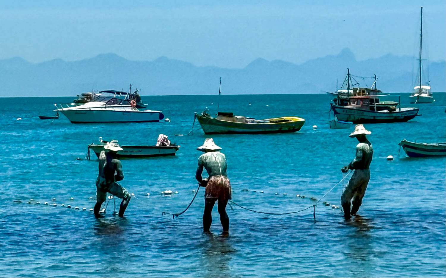 Buzios, Brazil Travel Guide: Best Things To See and Do 8 Os Três Pescadores sculpture at Praia da Armação in Búzios