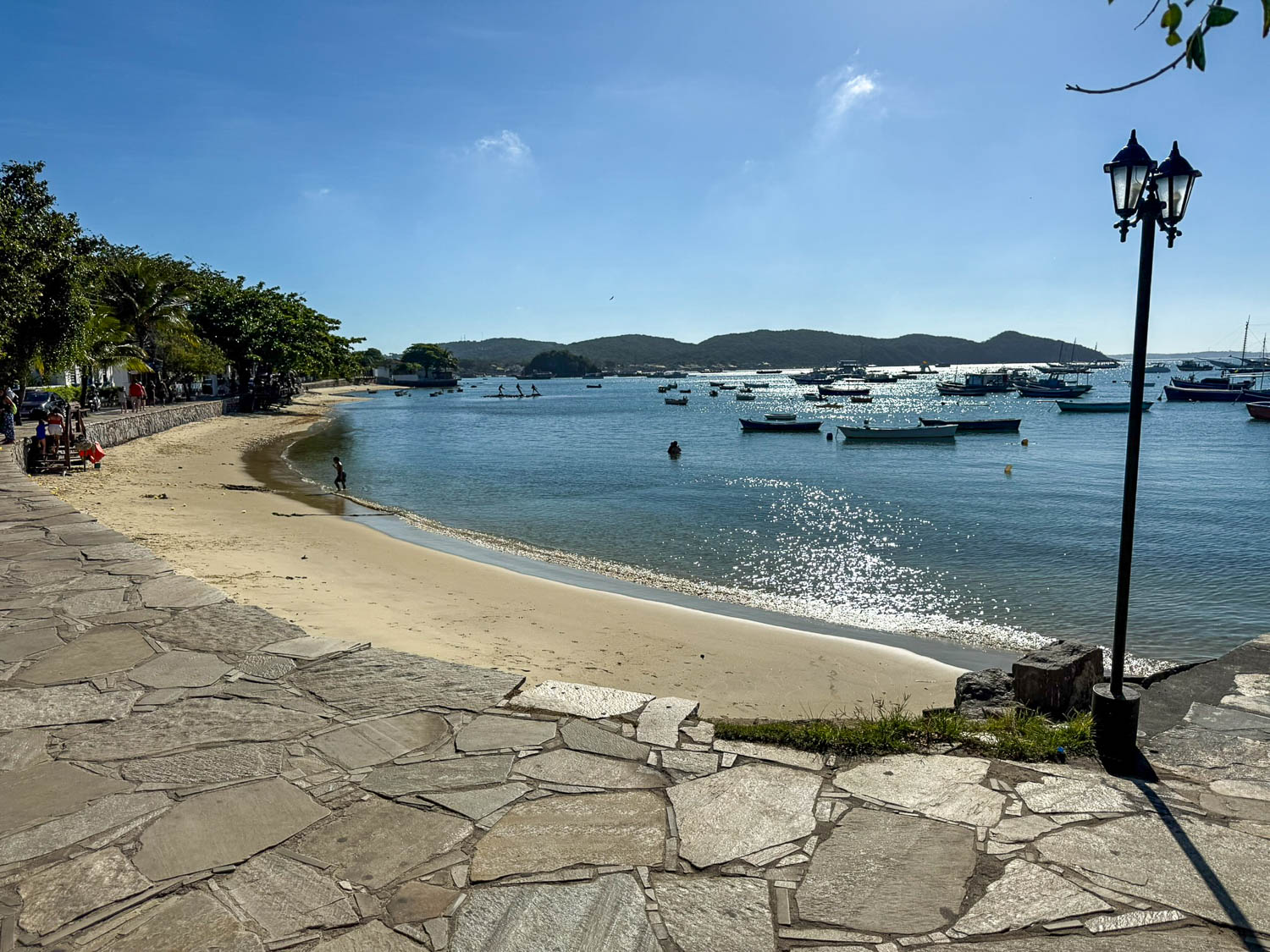 Buzios, Brazil Travel Guide: Best Things To See and Do 17 Calm waters and fishing boats at Praia da Armação in Buzios