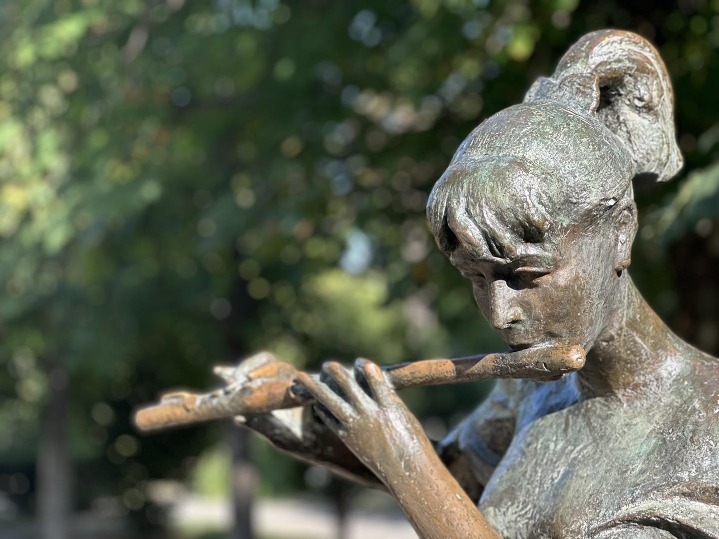 Statue of Girl Playing Flute Berat, Albania