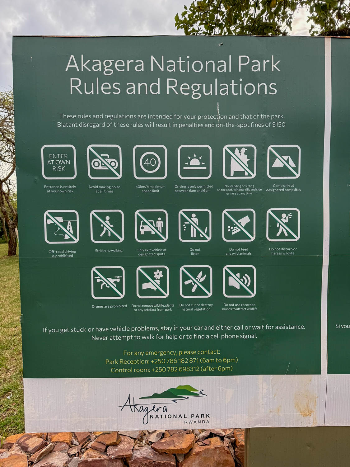 Rules and regulations signage in Akagera National Park promoting conservation in Rwanda