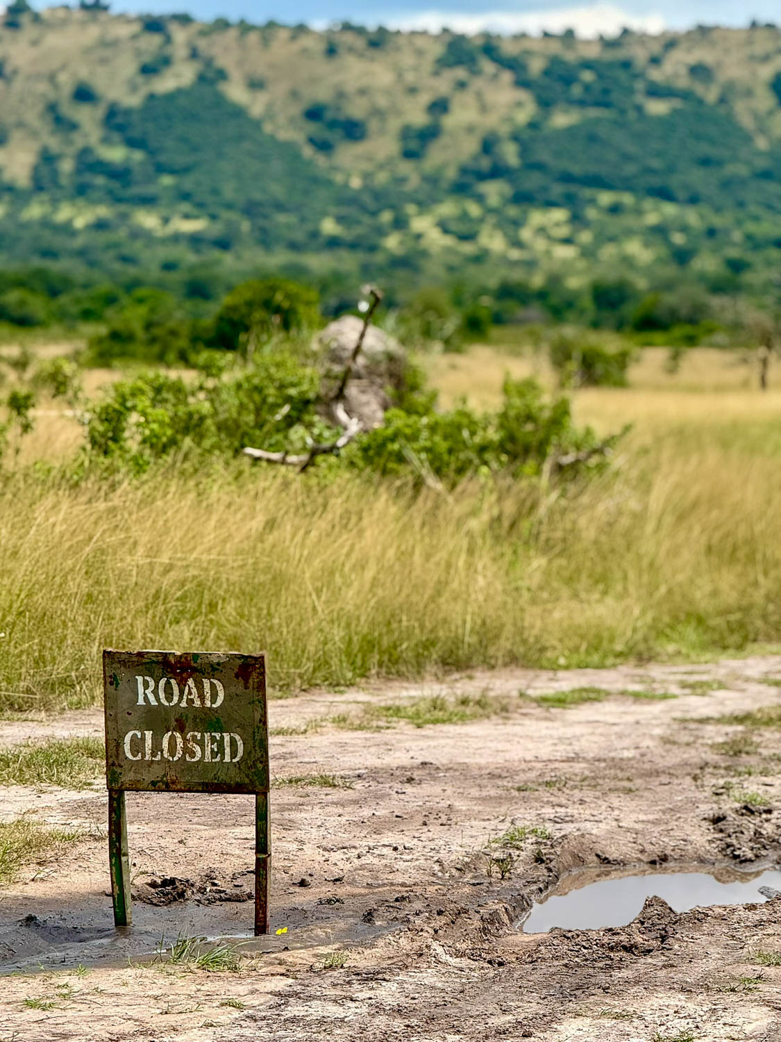 Muddy road conditions during the wet season in Akagera National Park, Rwanda