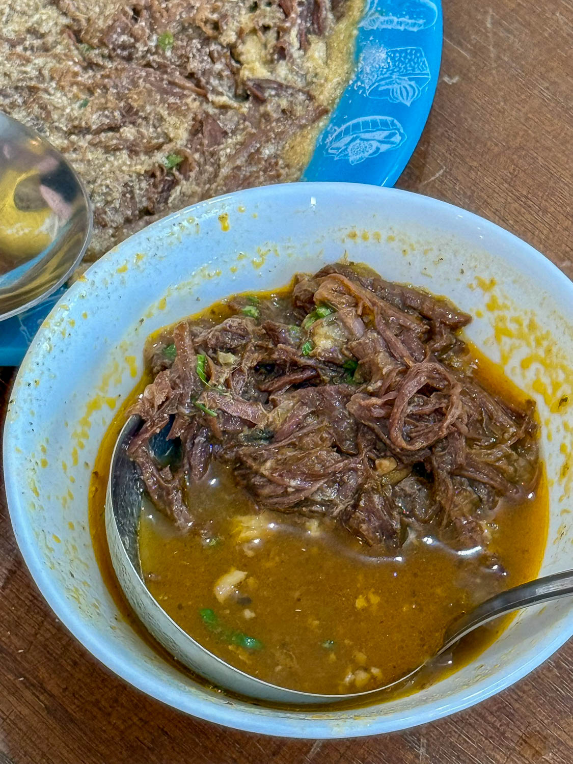 Traditional barreado stew served at Simples Gastrobar in Morretes, Paraná, Brazil.