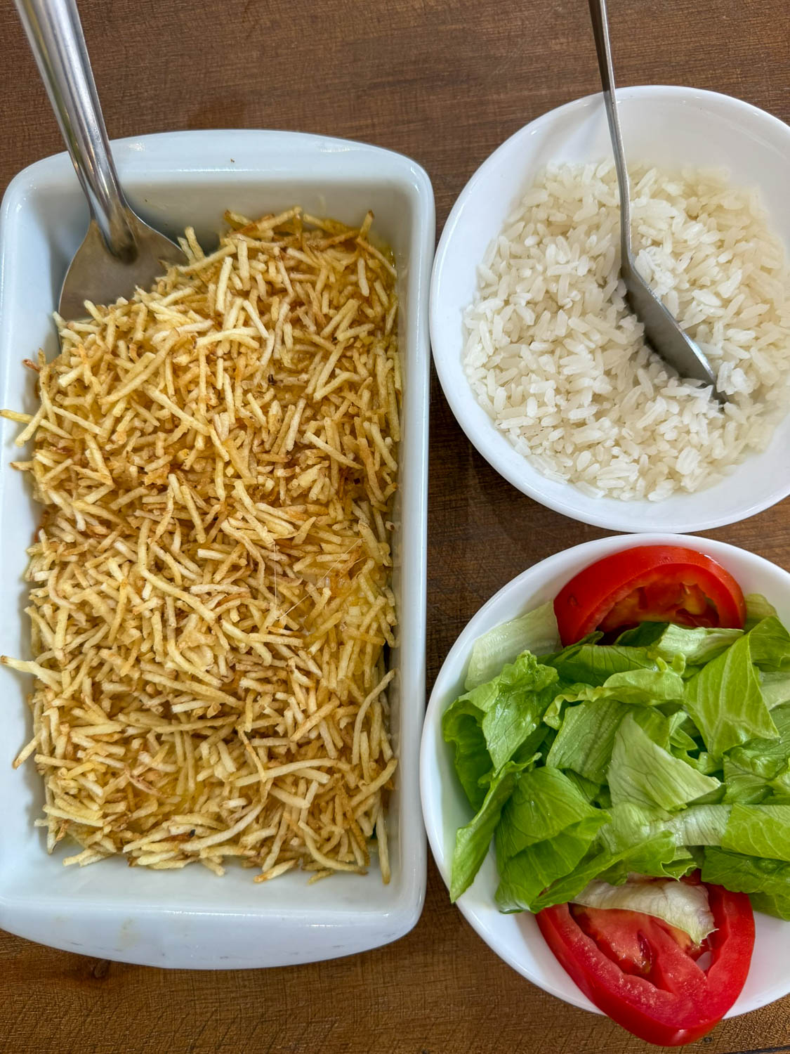 Everyday Brazilian meals built around simple sides like rice and beans across regions