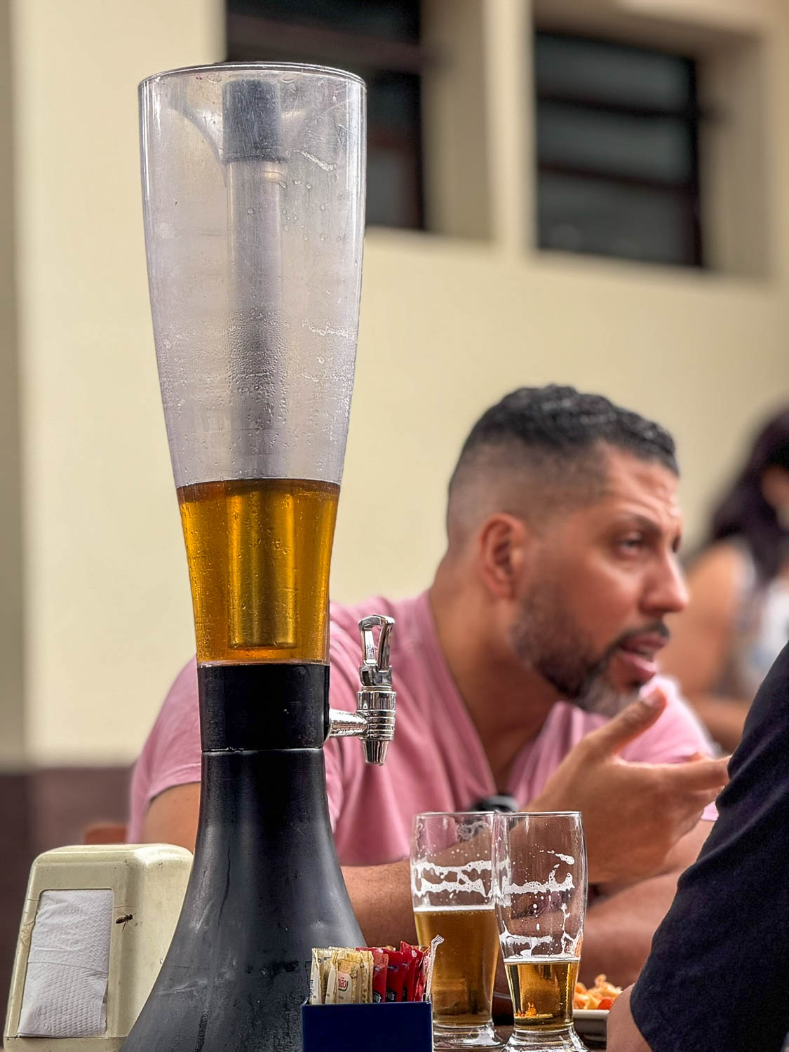 Traditional Brazilian Food: Iconic Dishes, Snacks, and Desserts 17 Brazilian churrasco dining experience with grilled meats and cold beer