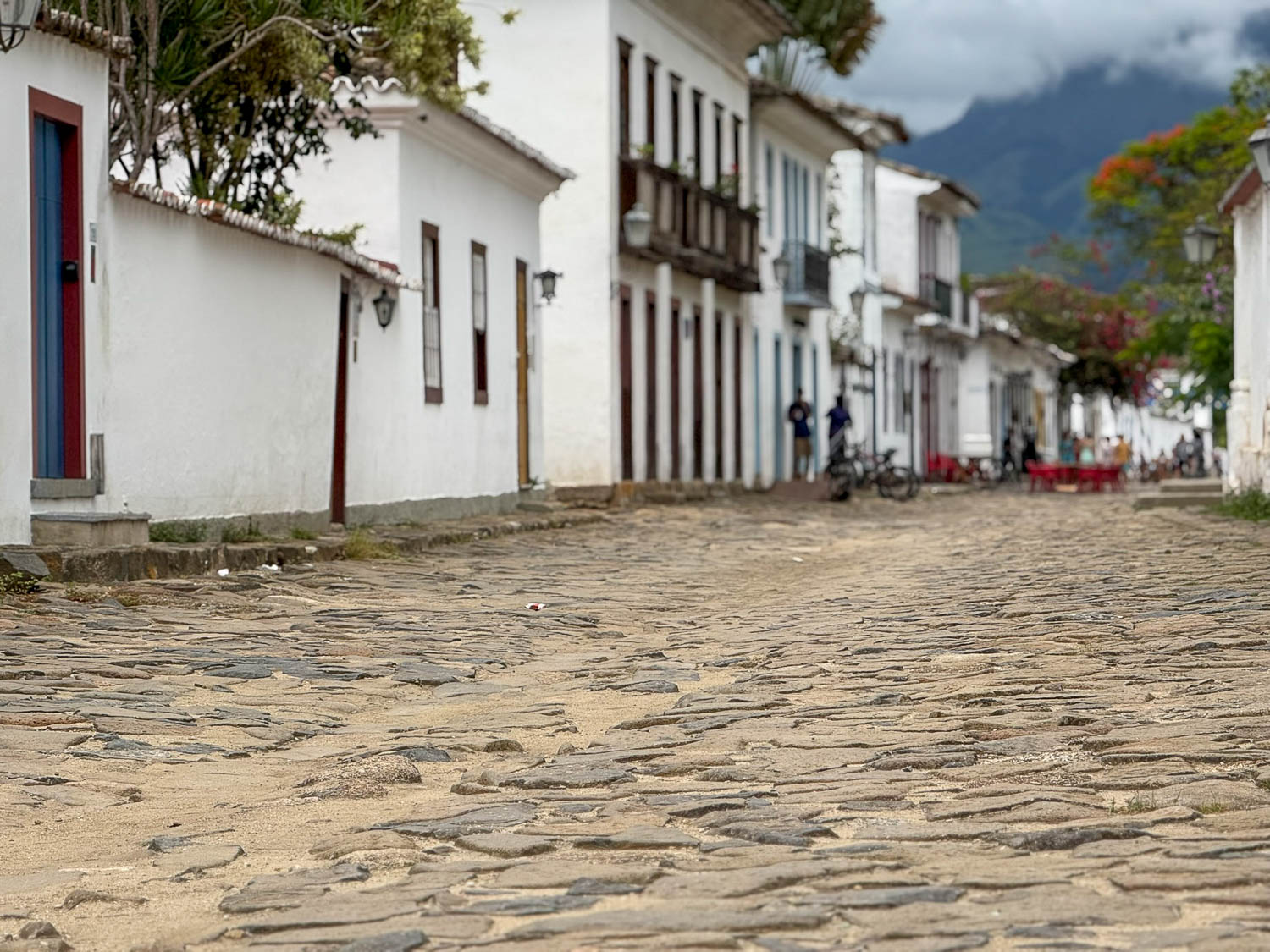 Uneven cobblestone streets in Paraty historic center requiring careful footing