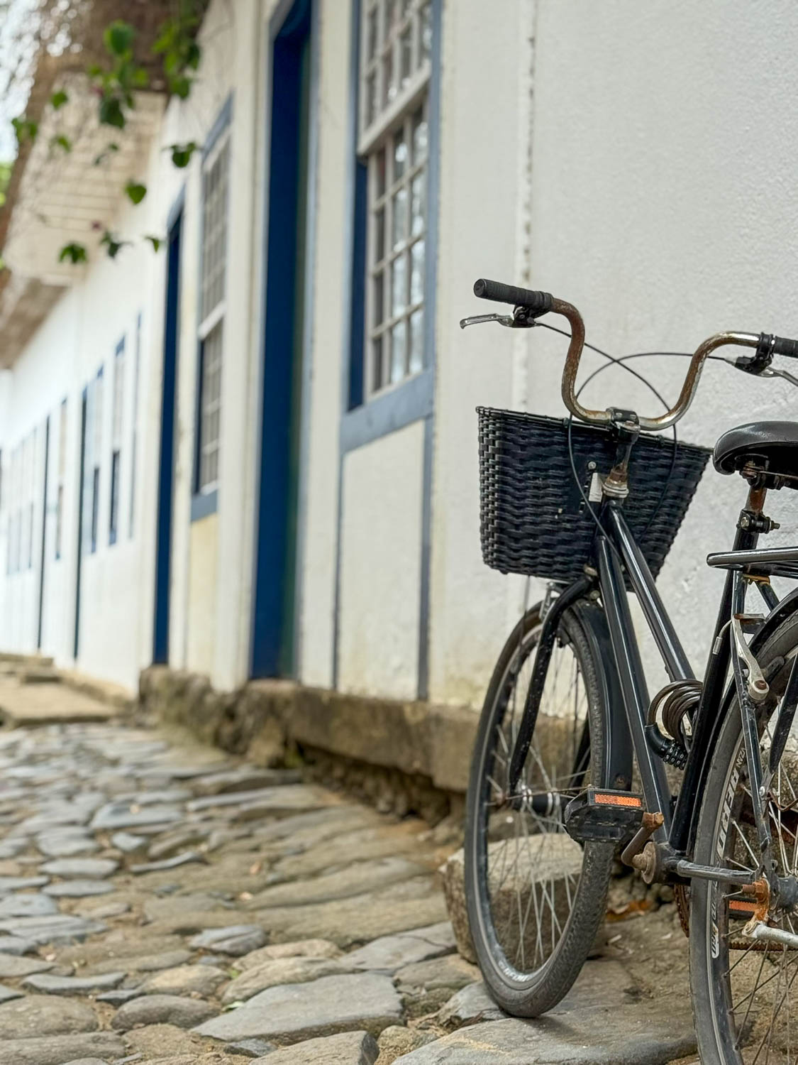 Cyclist exploring streets and neighborhoods around Paraty, Brazil