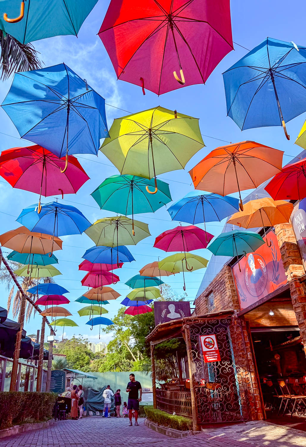 Best Things To Do in Embu das Artes: Travel Guide 6 Colorful umbrellas hanging above cobbled streets in the historic center of Embu das Artes Brazil