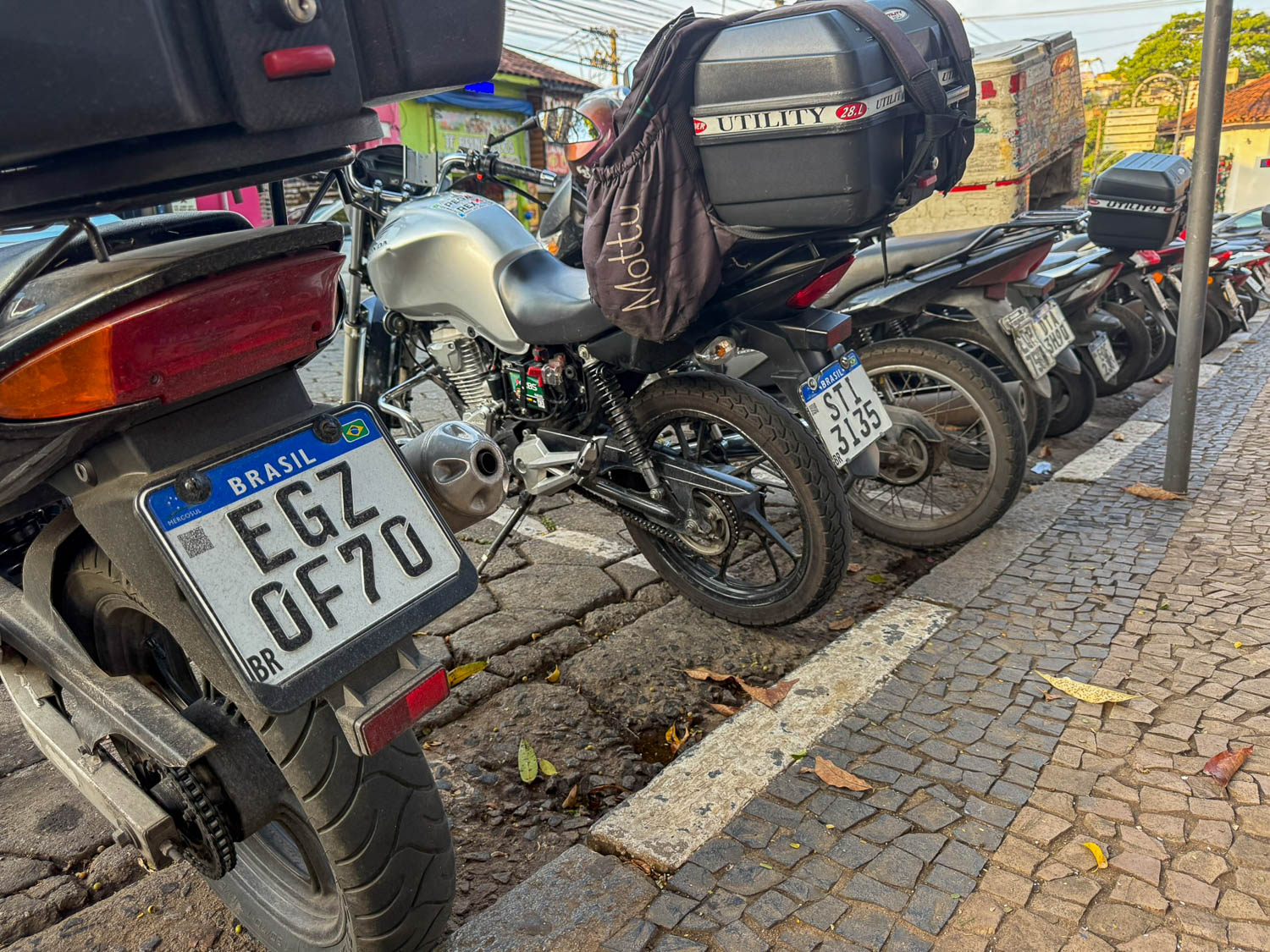 Best Things To Do in Embu das Artes: Travel Guide 8 Motorcycles parked along Rua Largo 21 de Abril street in Embu das Artes Brazil