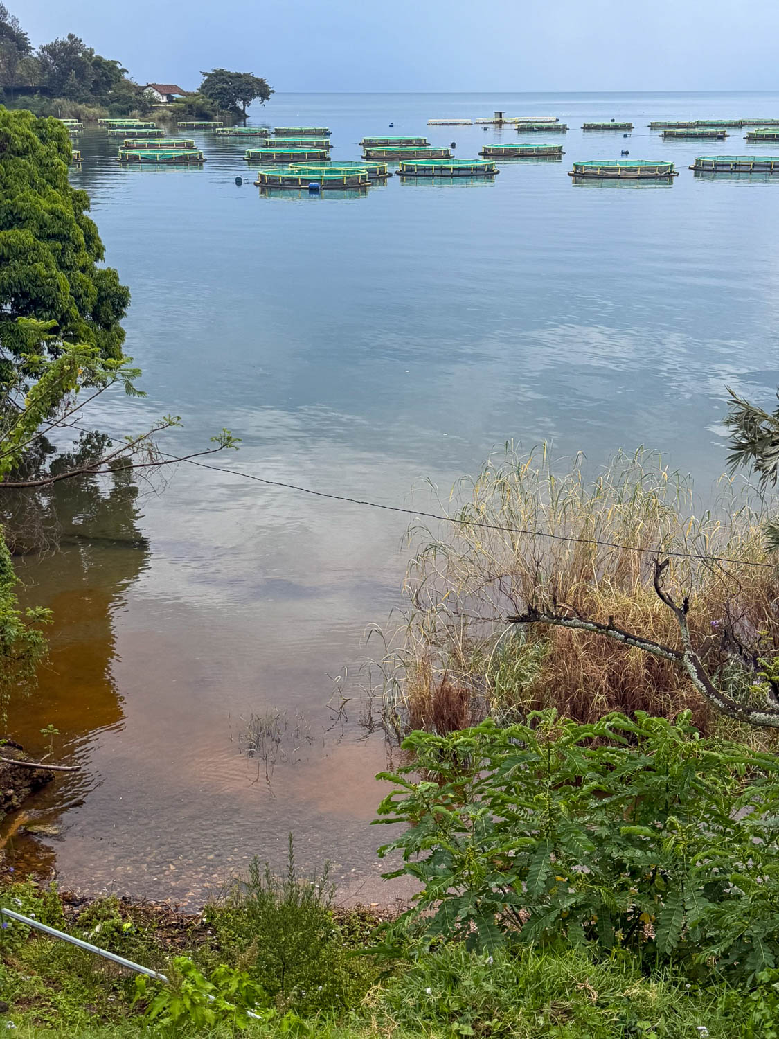 Fishing nets on Lake Kivu with underlying methane gas layers in Rwanda