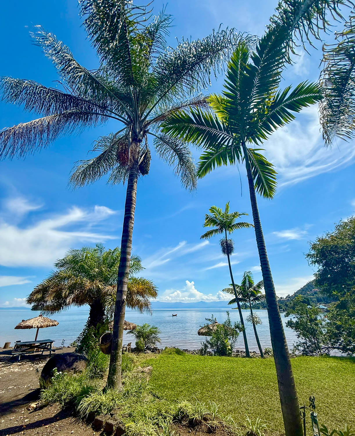 Scenic view of Lake Kivu with calm waters hiding deep geological activity