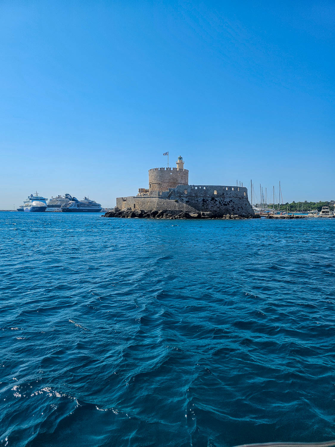 Old Town Rhodes, Greece: The Best Things To Do and See 23 Castle of Saint Nicholas at Mandraki Harbor in Rhodes Greece