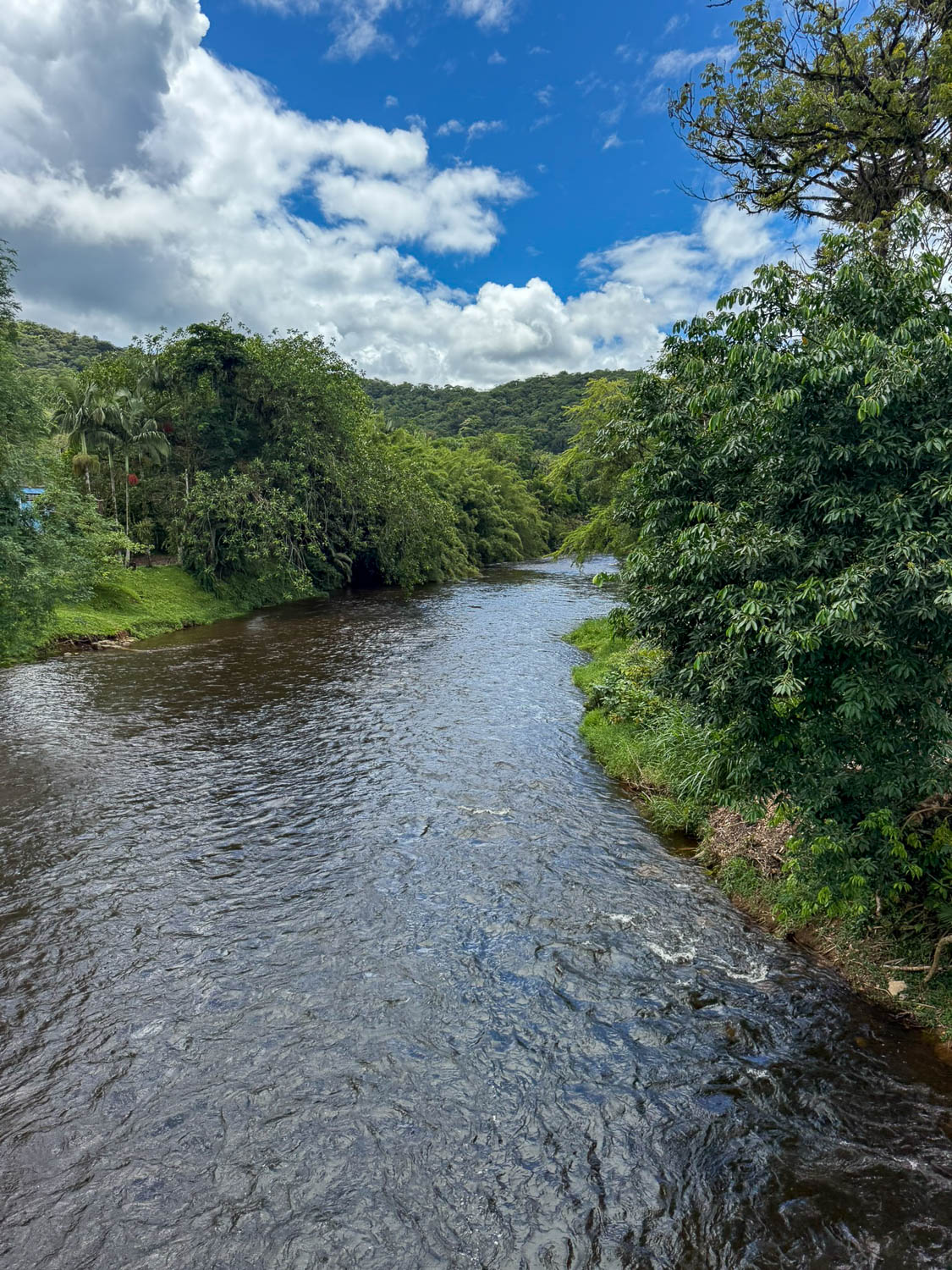 Sunny day in Morretes, Paraná, with blue skies over the historic colonial town surrounded by Atlantic Forest hills.