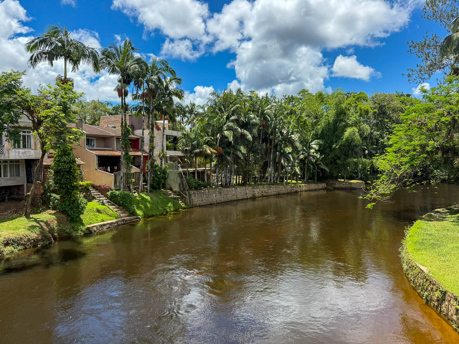 Nhundiaquara River flowing through Morretes in Paraná, surrounded by Atlantic Forest scenery.
