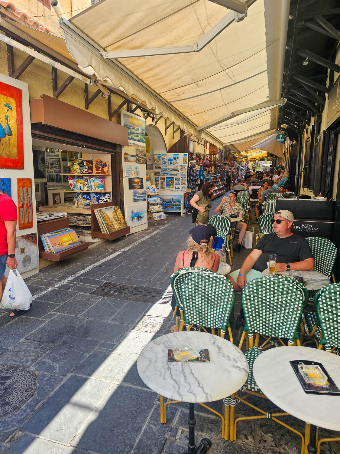 Old Town Rhodes, Greece: The Best Things To Do and See 11 Narrow streets in Old Town Rhodes Greece with shops cafes and hidden corners