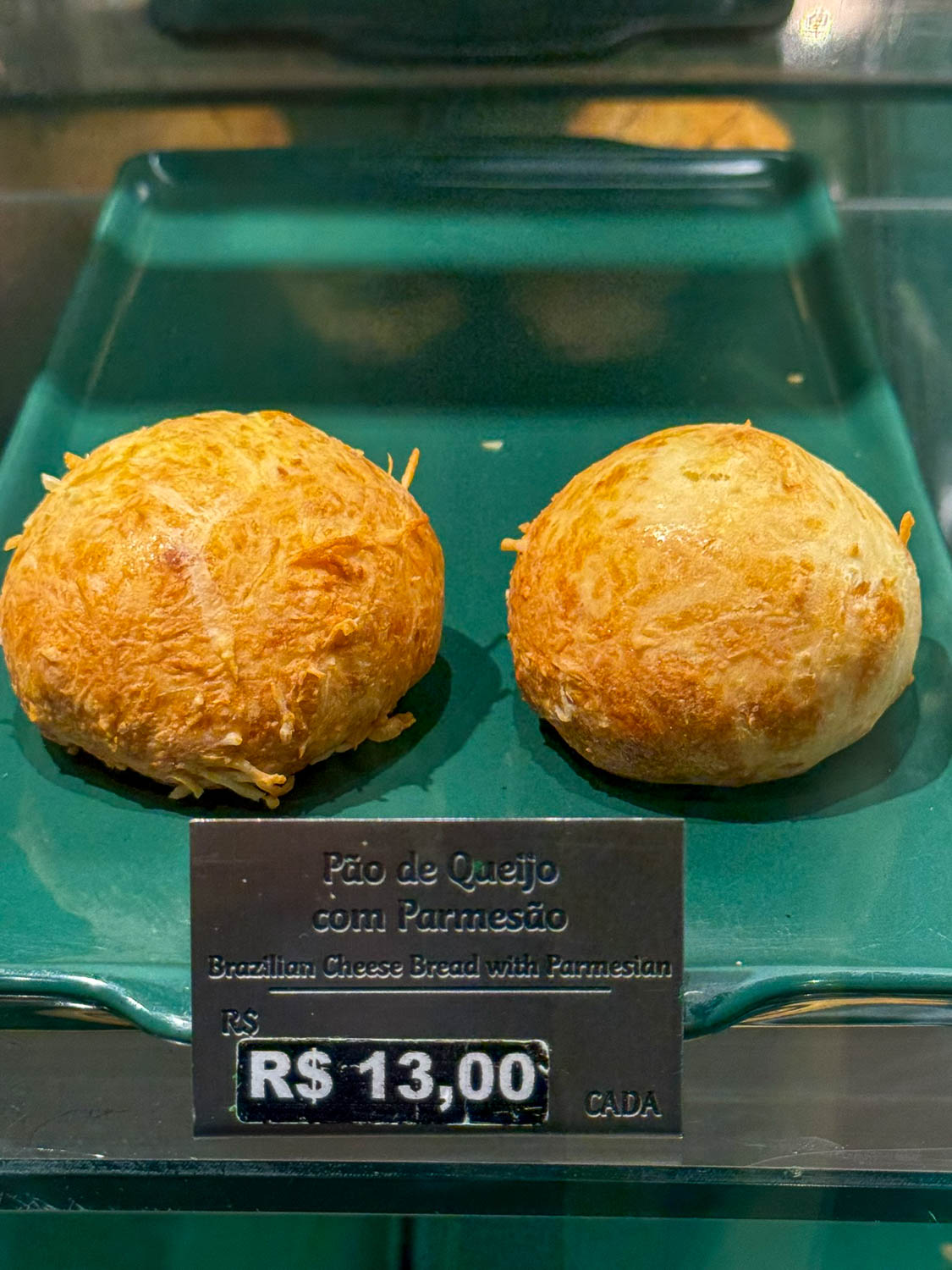 Traditional Brazilian Food: Iconic Dishes, Snacks, and Desserts 19 Warm pão de queijo cheese bread served in a Brazilian café