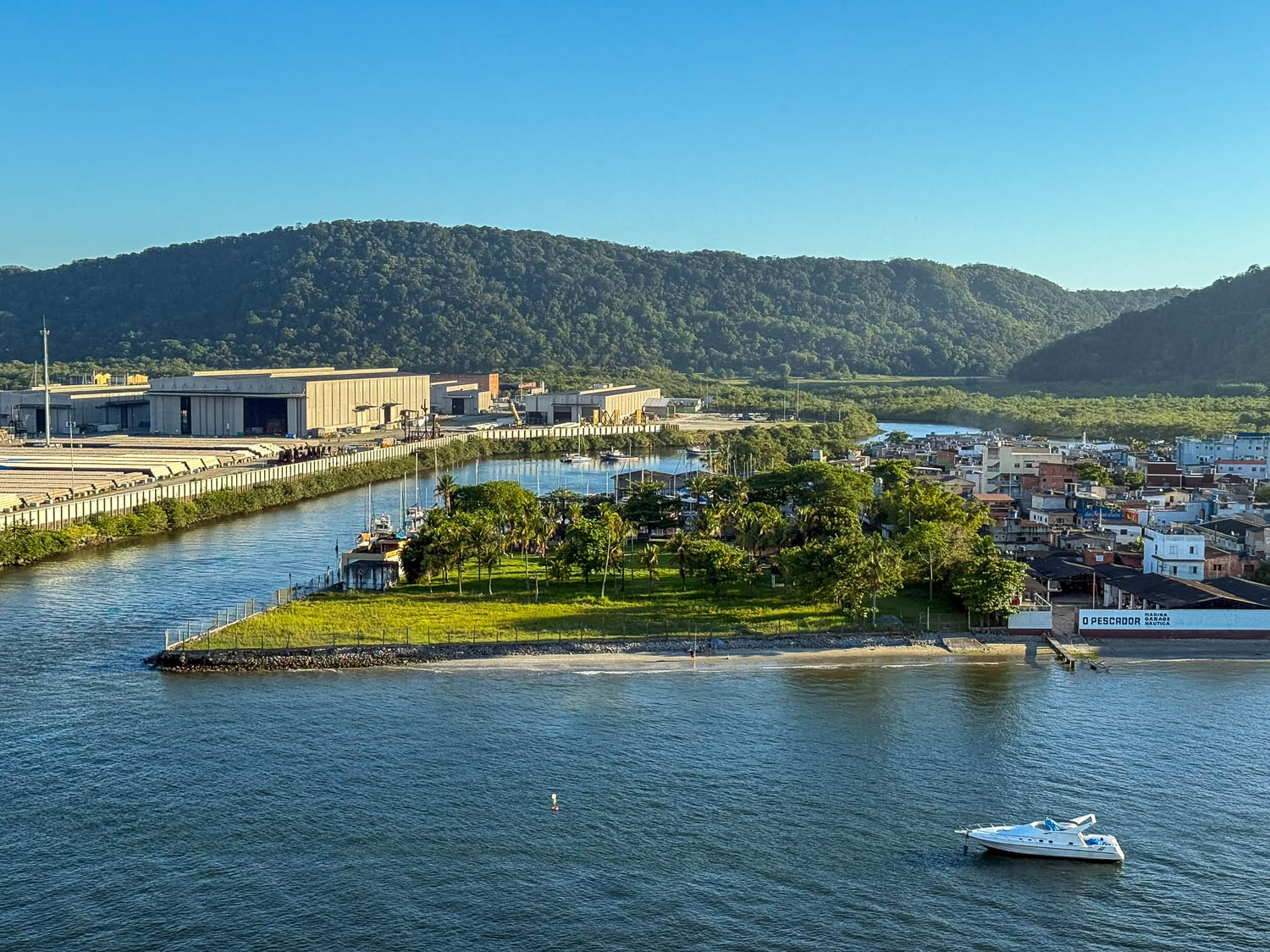 Cargo operations at the Port of Santos, Brazil, handling containers and bulk goods for import and export.