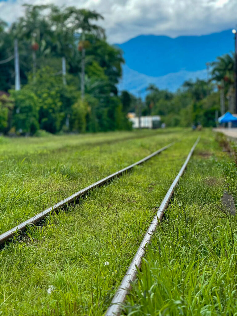 Serra Verde Express scenic train arriving in Morretes, Paraná after traveling through Brazil’s Atlantic Forest from Curitiba.