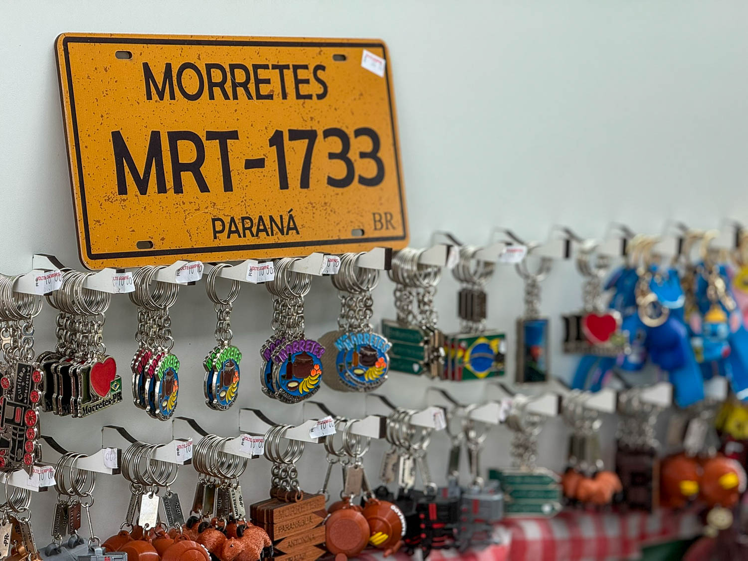 Souvenir shopping in artisan shops in Morretes’ historic center in Paraná, Brazil.