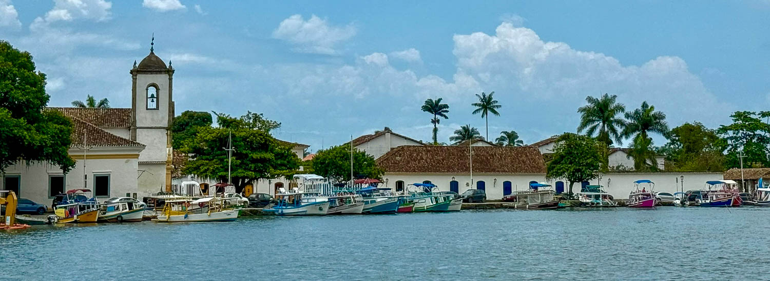 View looking back toward Paraty historic center and coastline in Brazil