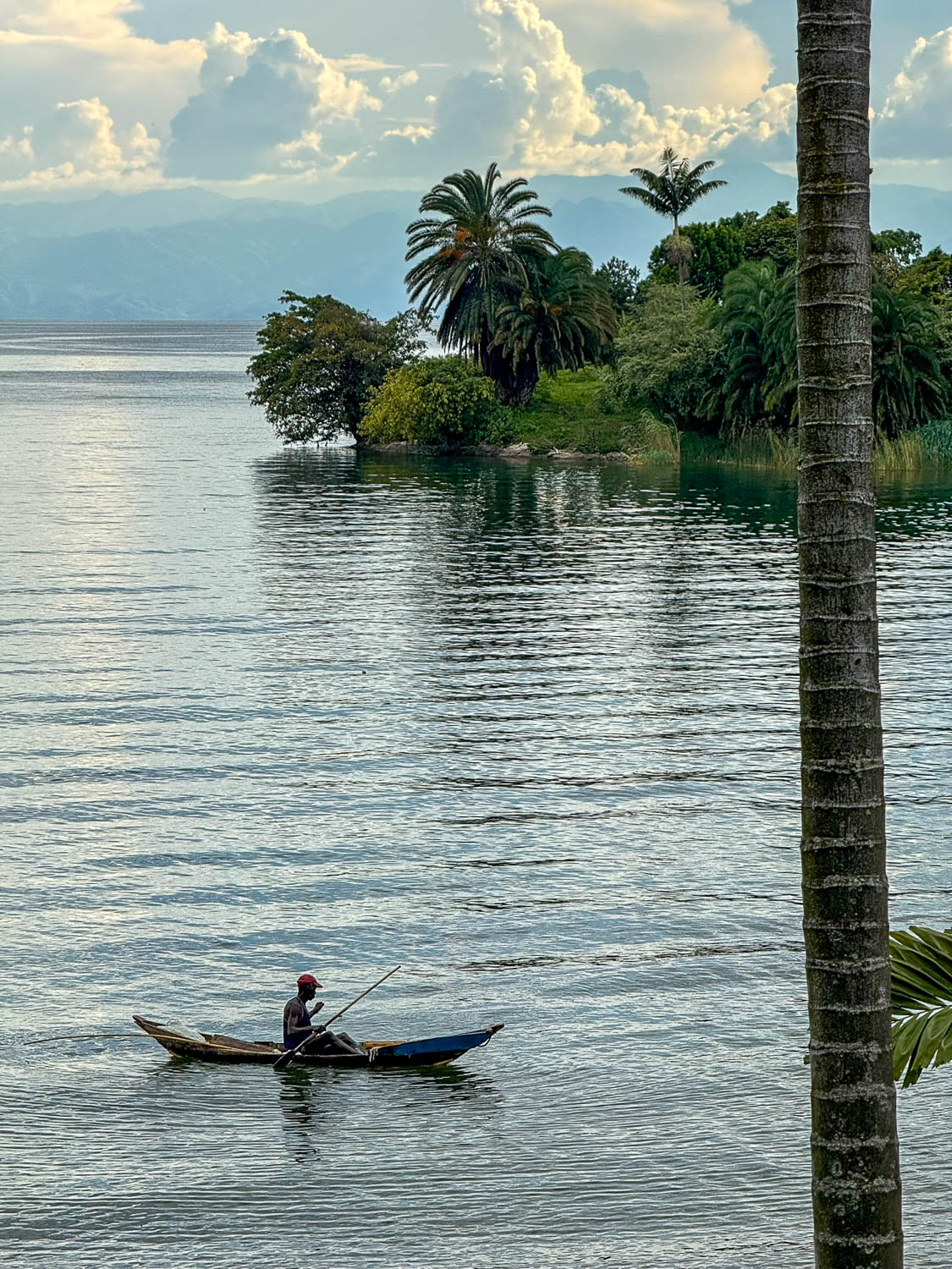 Local fisherman on Lake Kivu in Kigufi Rwanda reflecting daily life