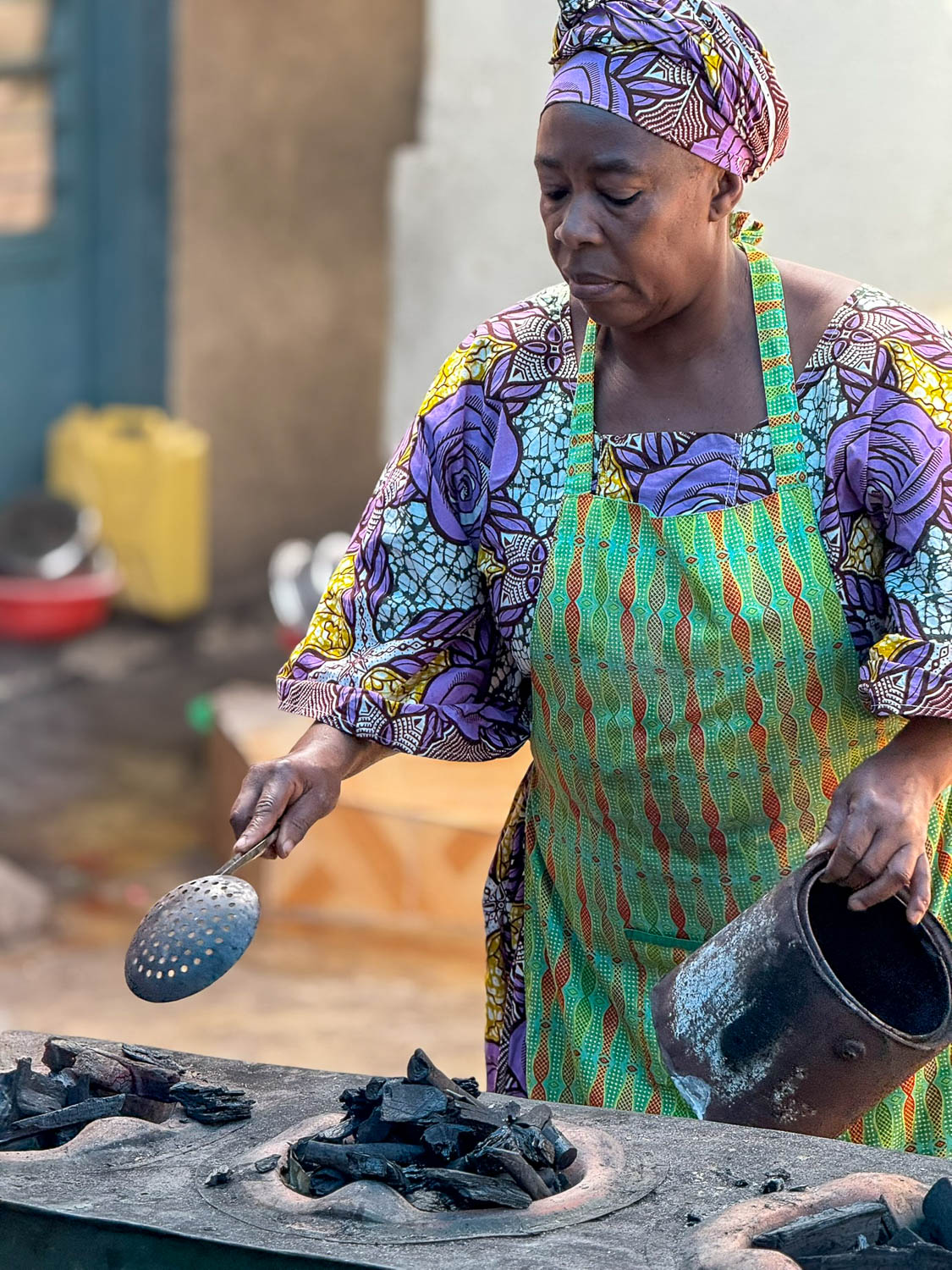 Cooking class instructor at Nyamirambo Women’s Center Kigali teaching traditional Rwandan cuisine