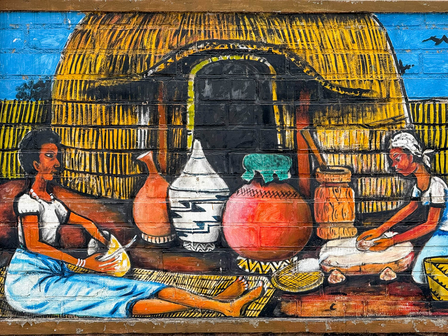 Artwork depicting traditional Rwandan culture and heritage displayed at Ethnographic Museum Rwanda