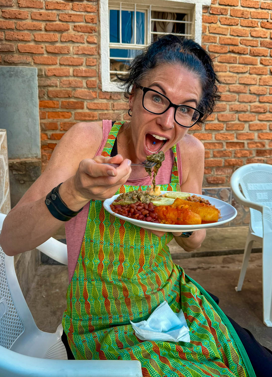 Traveler enjoying an authentic Rwandan cuisine experience in Kigali
