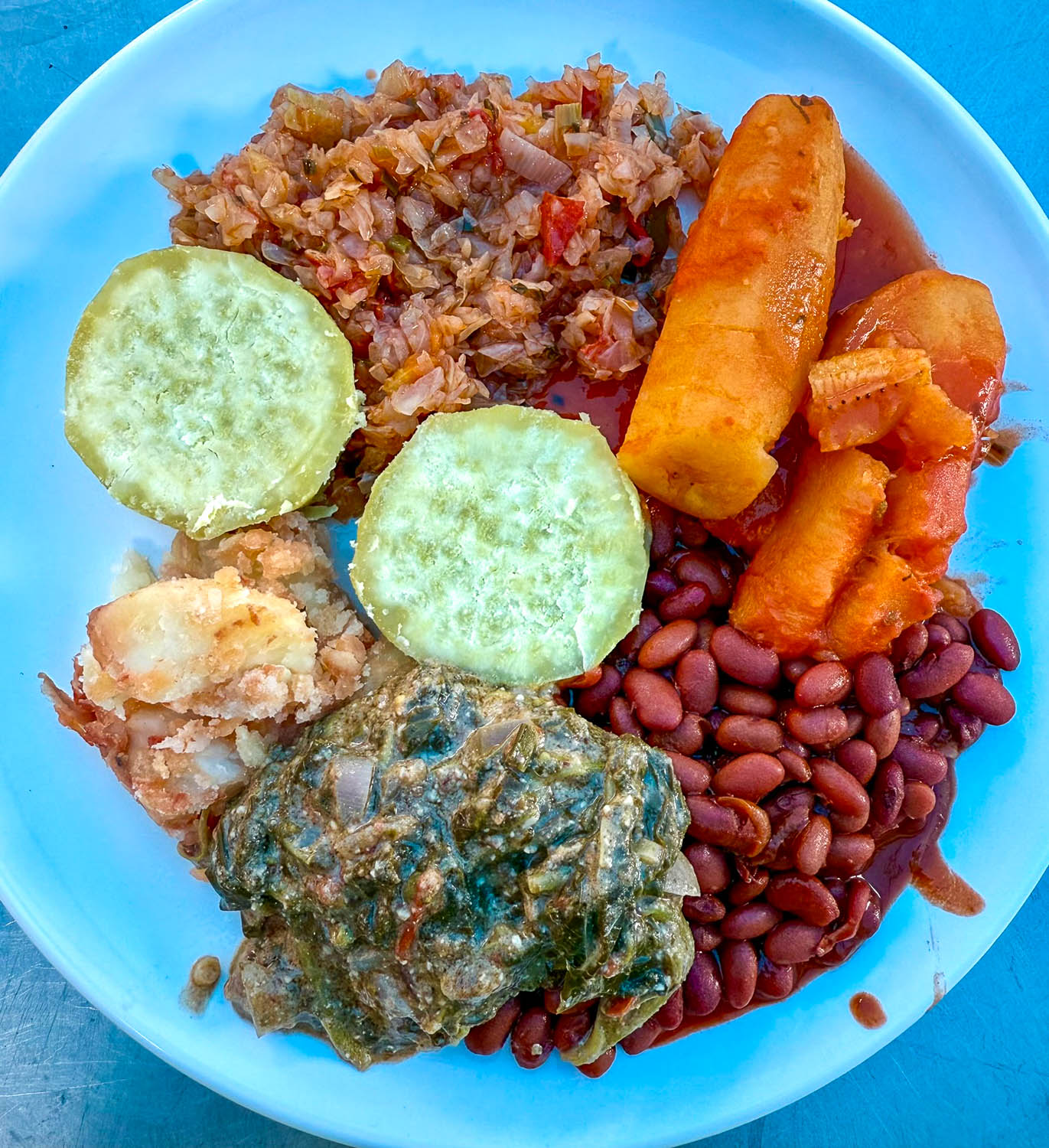 Hearty home-cooked Rwandan cuisine meal with traditional staples in Kigali