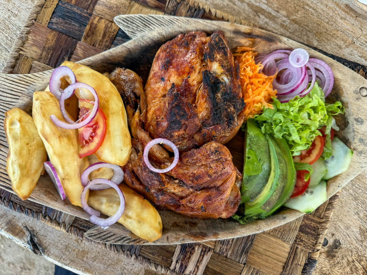 Traditional Rwandan cuisine meal served at Paradis Malahide in Kigufi featuring local staples