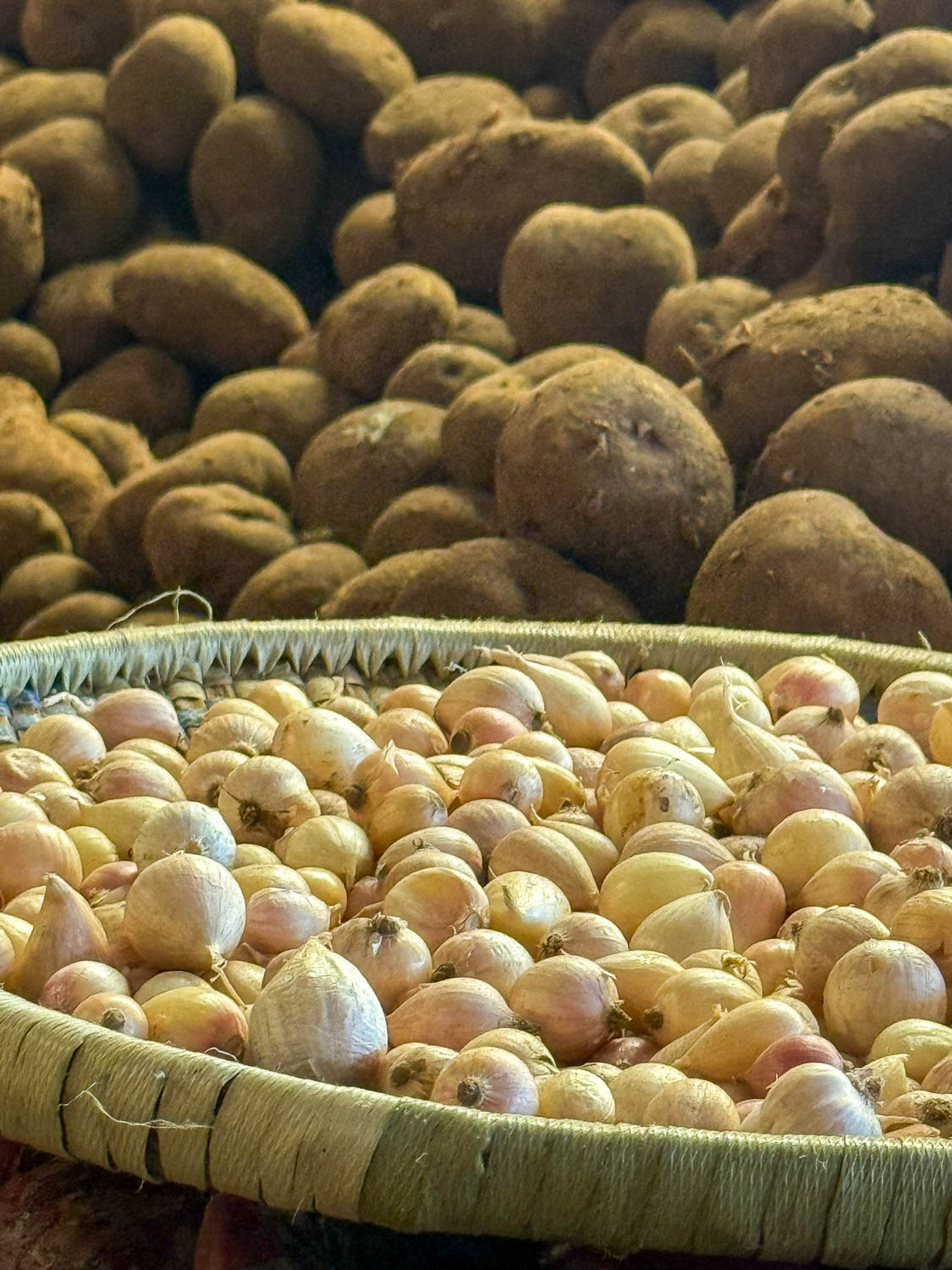 Common staple ingredients used in Rwandan cuisine including beans, cassava, and plantains