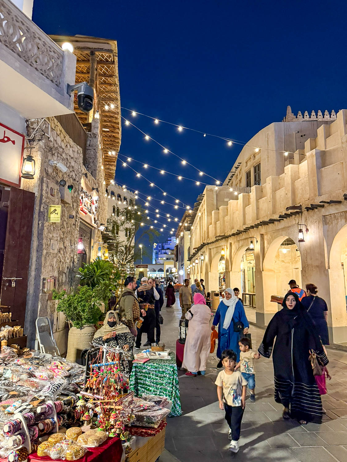 Evening lights and festive atmosphere at Souq Waqif festivals in Doha Qatar