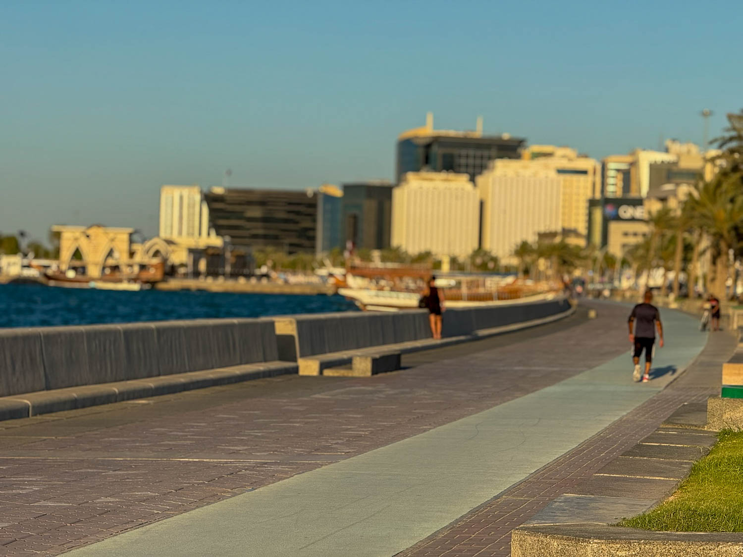 Accessible pedestrian walkways and waterfront paths along the Doha Corniche