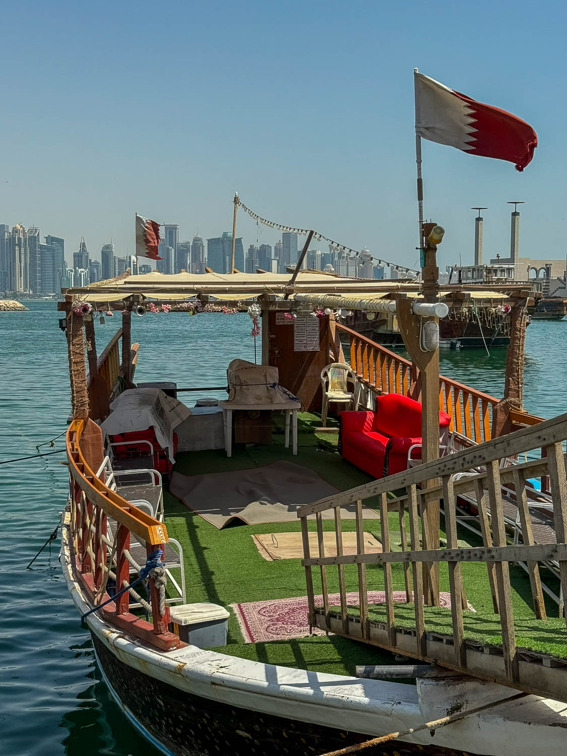 Travelers preparing to board a traditional dhow cruise in Doha Qatar