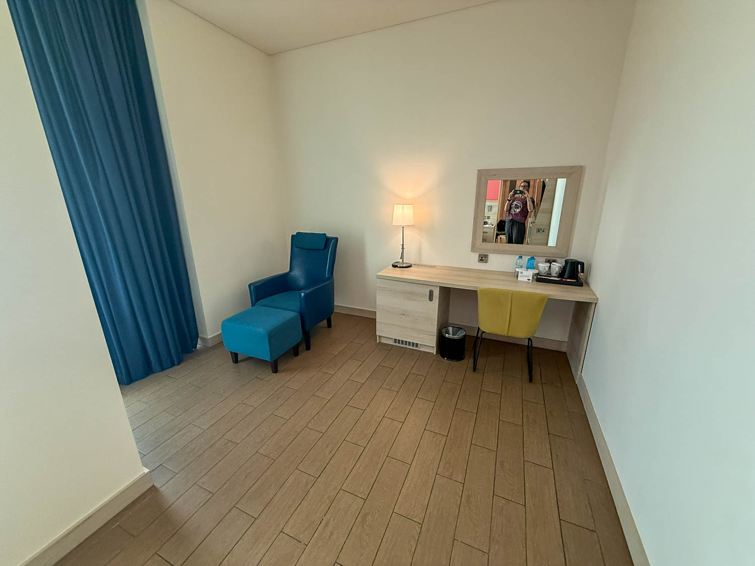Comfortable budget hotel room with city views in Doha Qatar
