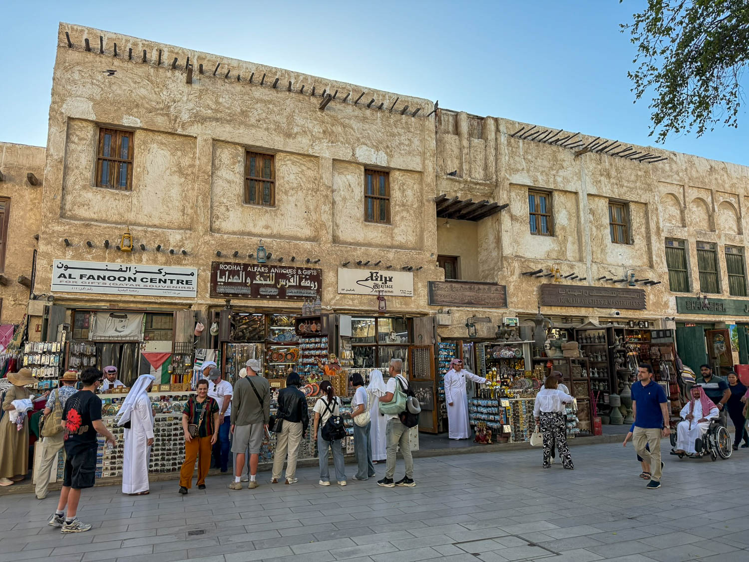Visitors dressed modestly while exploring Souq Waqif in Doha Qatar