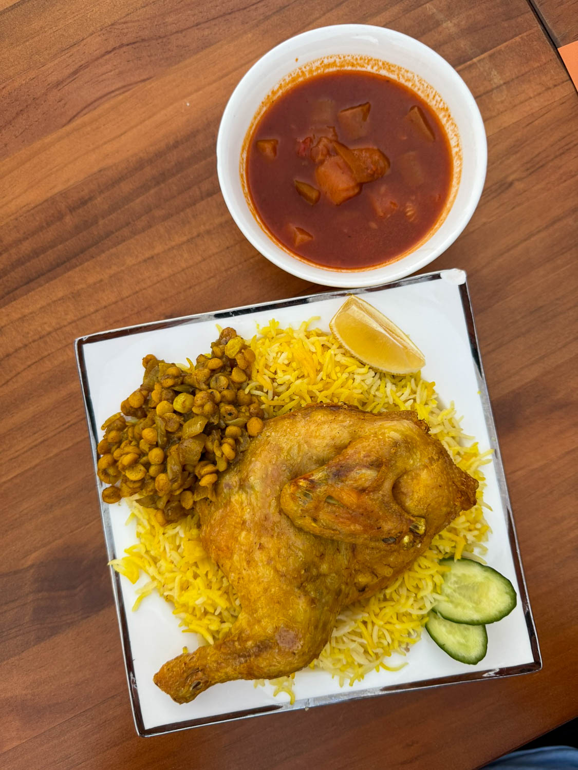 Traditional Qatari cuisine served near Dhow Harbour in Doha Qatar