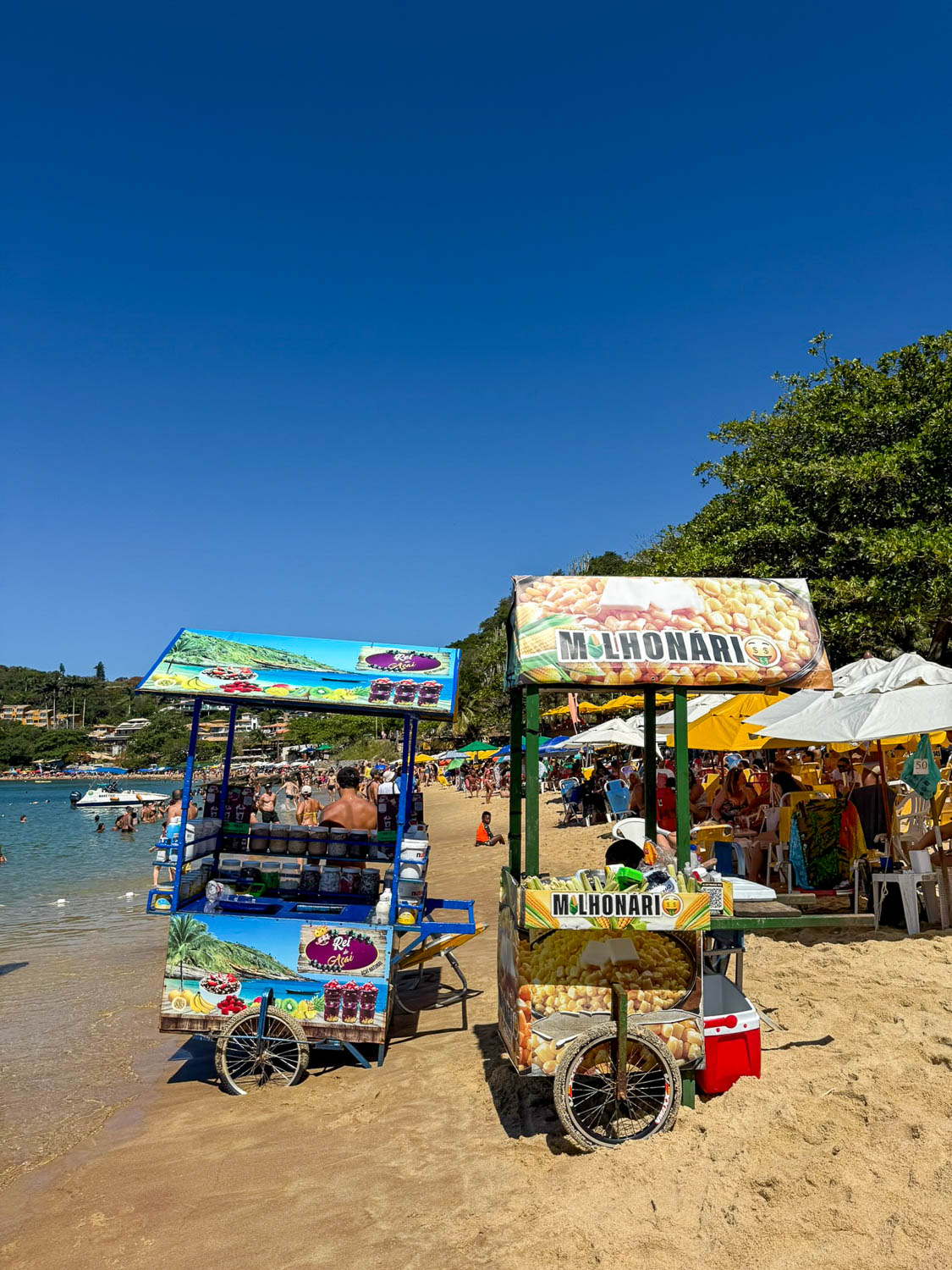 Beach vendors serving drinks and snacks at Ponta Verde Beach in Maceio