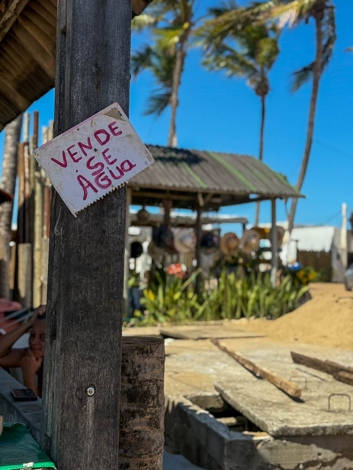 Beach vendors serving refreshments along the shoreline in Maceió Brazil
