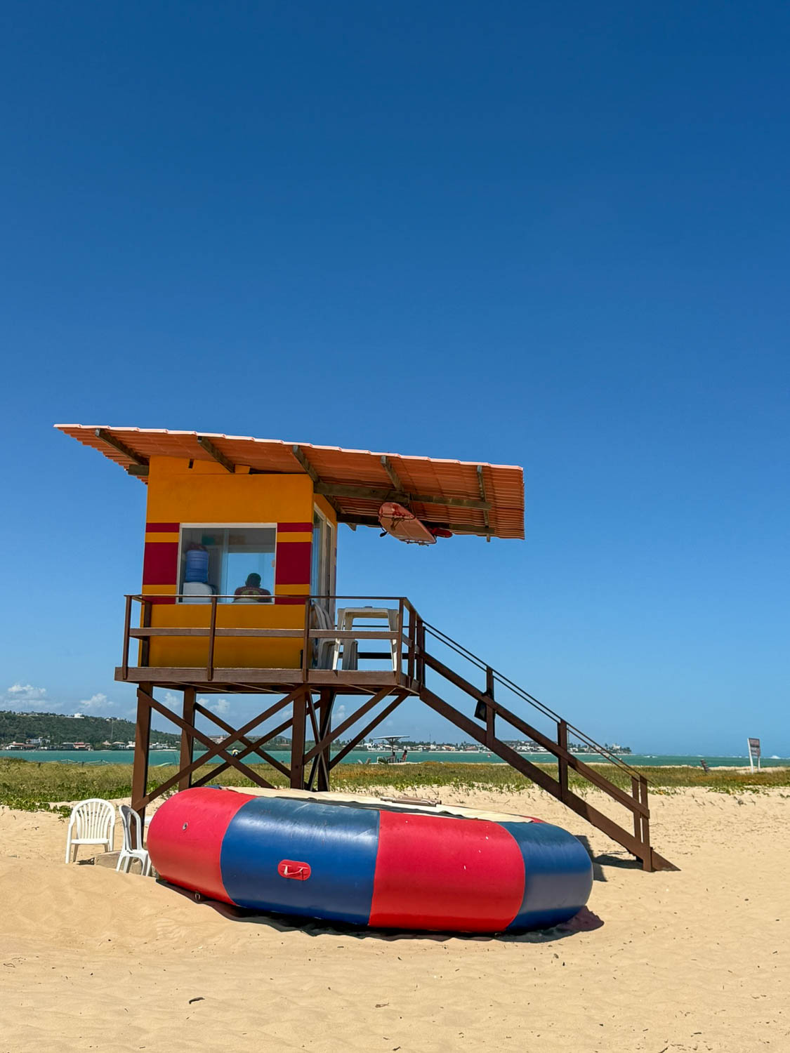 Lifeguards monitoring a patrolled beach in Maceió Brazil to help keep visitors safe