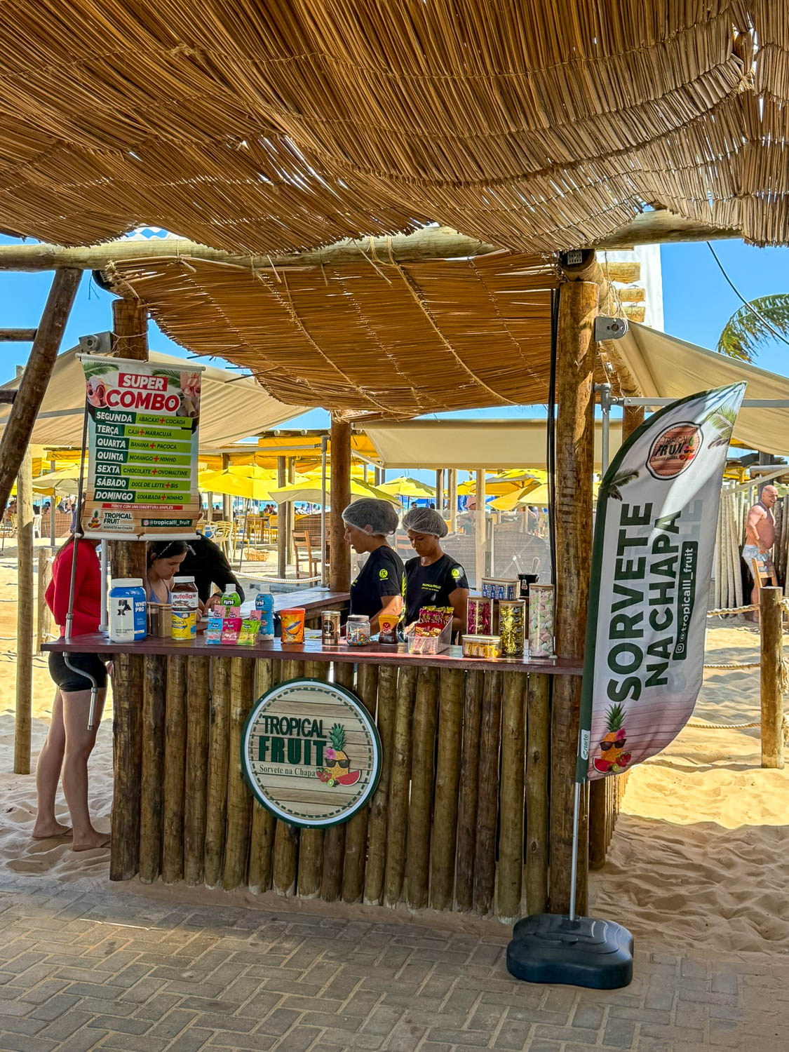 Visitors relaxing at Praia de Pajucara, one of the best beaches in Maceio