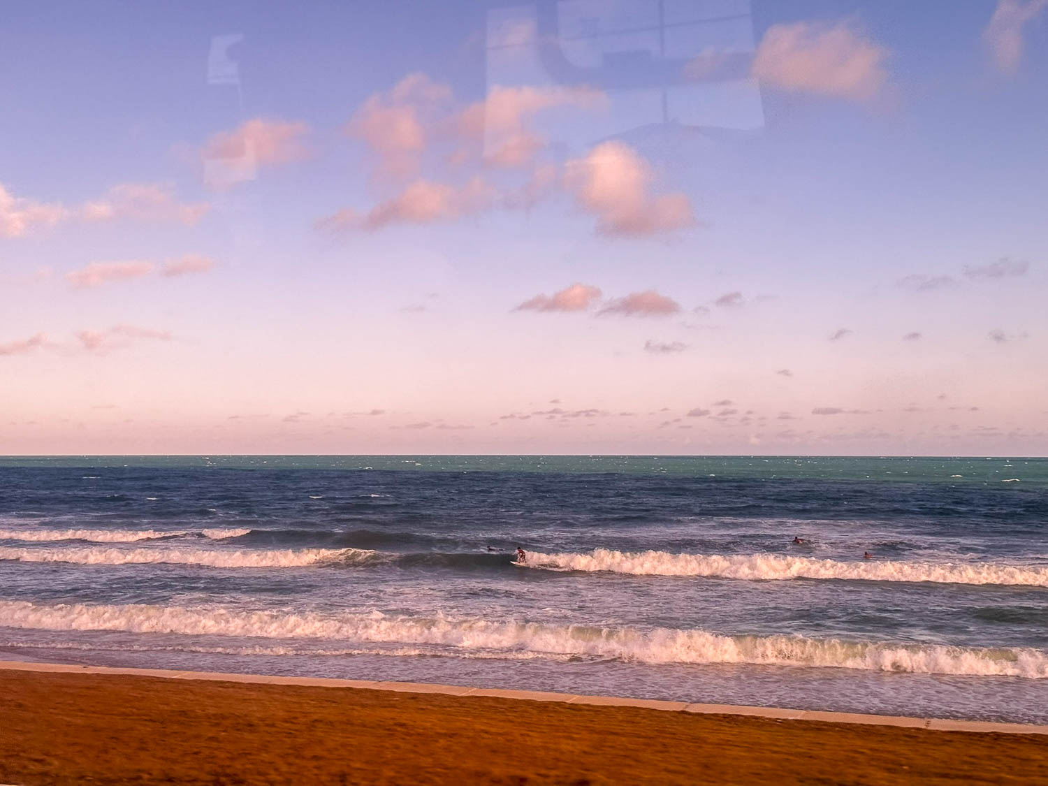 Surfer enjoying the waves at one of the beaches in Maceio, Brazil